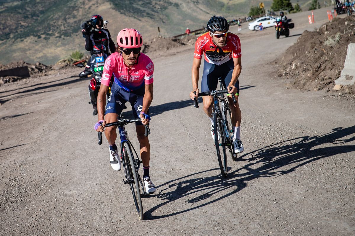 Lachlan Morton (EF Education First) leads Hayden McCormick (Team Bridgelane) in ther final dirt road section