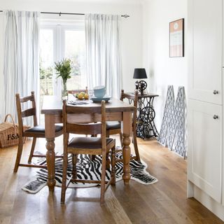 dining room with wooden dining table with chairs