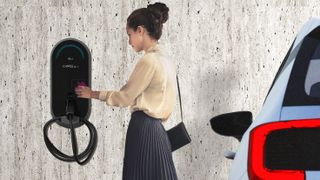 A woman charge her EV with LG Electronics technology. 