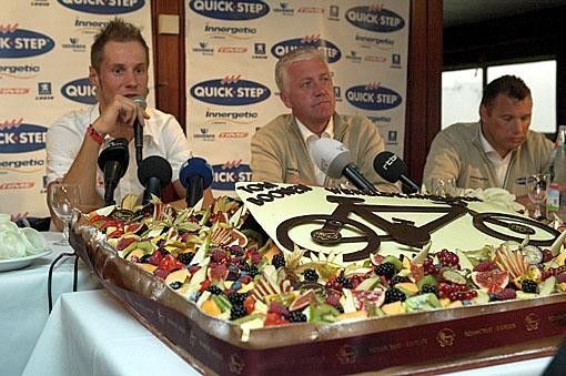 Tom, Patrick Lefevre and Wilfried Peeters behind the enormous cake