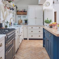Shaker kitchen with drawers and cupboards and island.