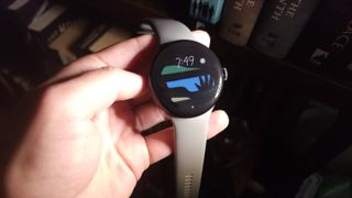 A photo of the Google Pixel Watch 3 showing thick black bars over the display, indicating that the display uses PWM dimming.