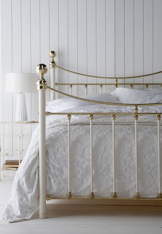 wrought iron bed in bedroom