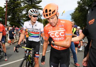 Daryl Impey checks on Patrick Bevin after stage 5 at the Tour Down Under