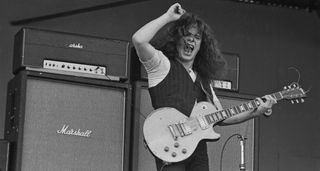 Paul Kossoff wails on his Les Paul Standard in front of some NMV Marshall stacks, playing live with Free at the 1970 Isle of Wight Festival.