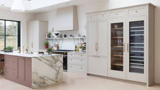 Mushroom kitchen by Higham Furniture with pink island
