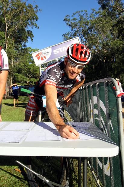 2012 Men's marathon champion Andy Blair signs in