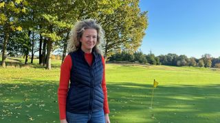 Golfer wears G/FORE Women’s Down Quilted Taffeta Tech Gilet