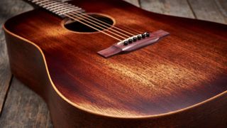 Close up of a Martin D-15M acoustic guitar