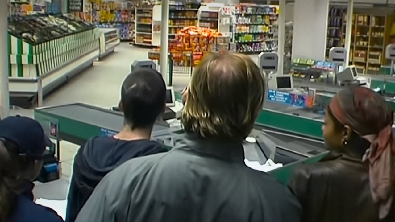 The 28 Days Later cast standing in a grocery store.