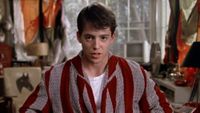 Matthew Broderick in robe looking at the camera in Ferris Bueller's Day Off