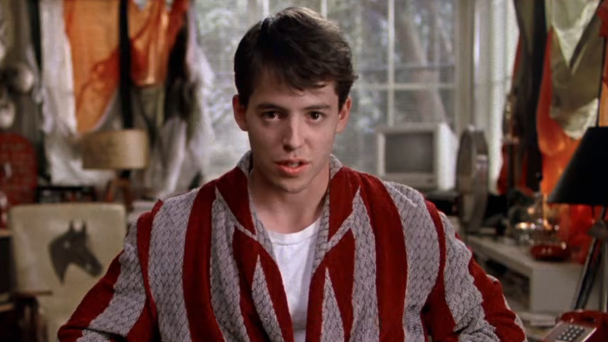Matthew Broderick in robe looking at the camera in Ferris Bueller's Day Off