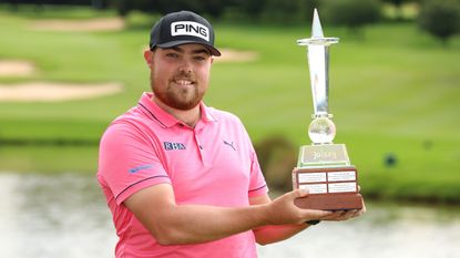 Dan Bradbury with the Joburg Open trophy