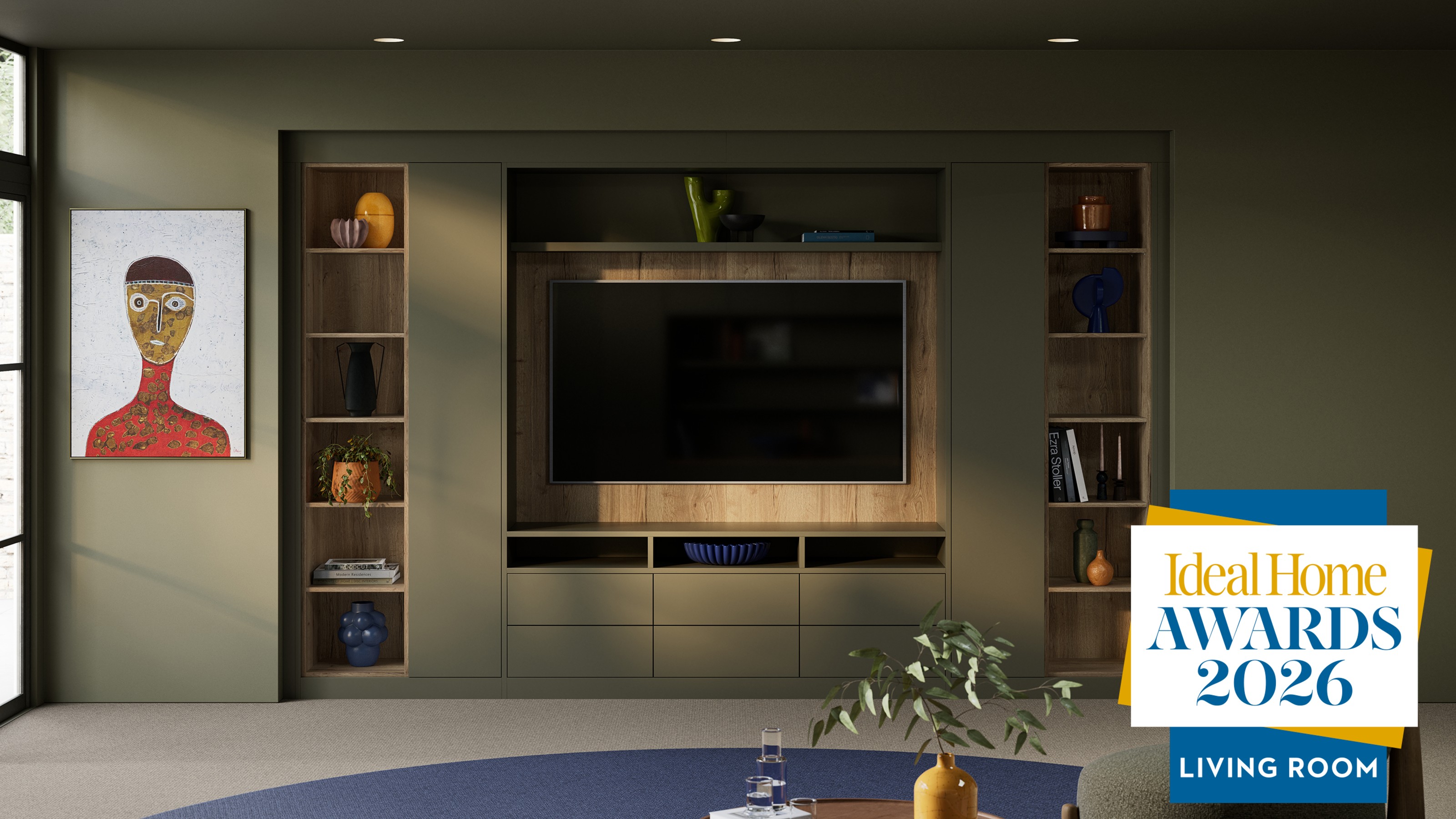 The Tavira storage system in Olive Green by Hammonds in a living room housing a TV