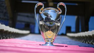 Champions League trophy on stadium steps