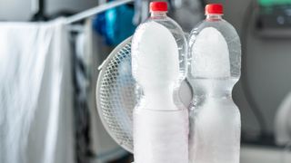 Frozen bottles in front of a fan