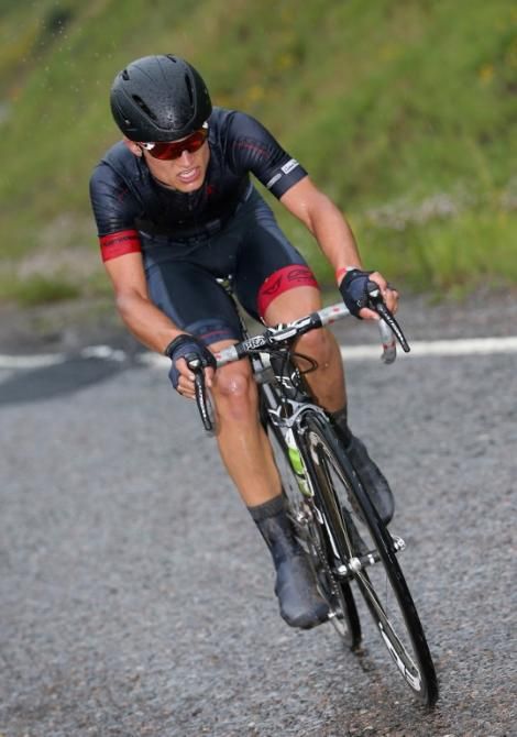 Robin Carpenter (Hincapie Sportswear Development Team) rides on in the rain