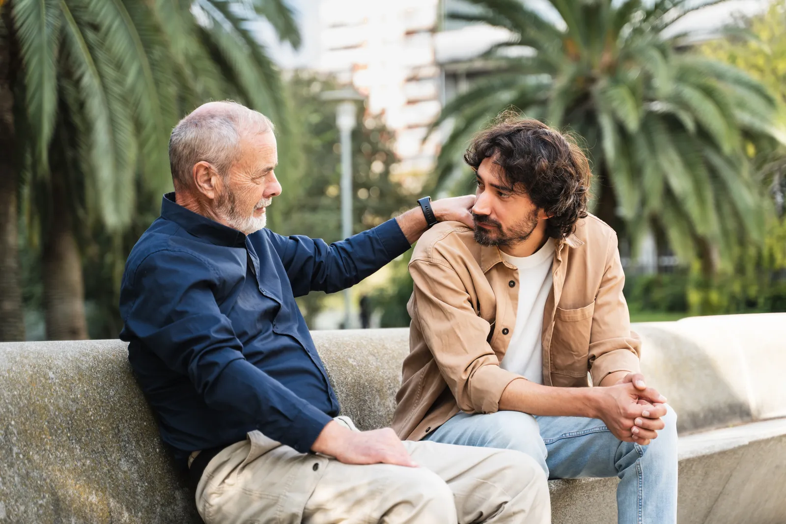 A father and his adult son talk finances.