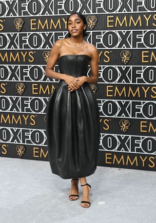 Ayo Edebiri attends the 75th Primetime Emmy Awards at Peacock Theater on January 15, 2024 in Los Angeles, California in a leather bubble dress