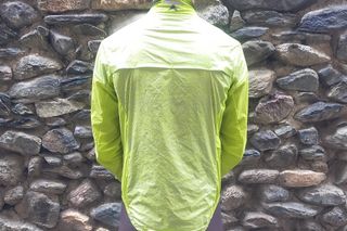 Image shows a rider wearing the Altura Icon Rocket Men's Packable Jacket.