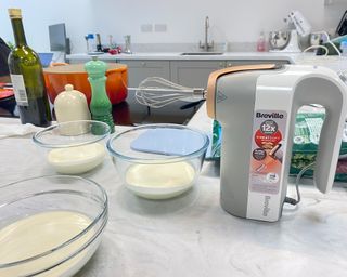 Image of Oster Heatsoft Mixer being used for whipped cream test