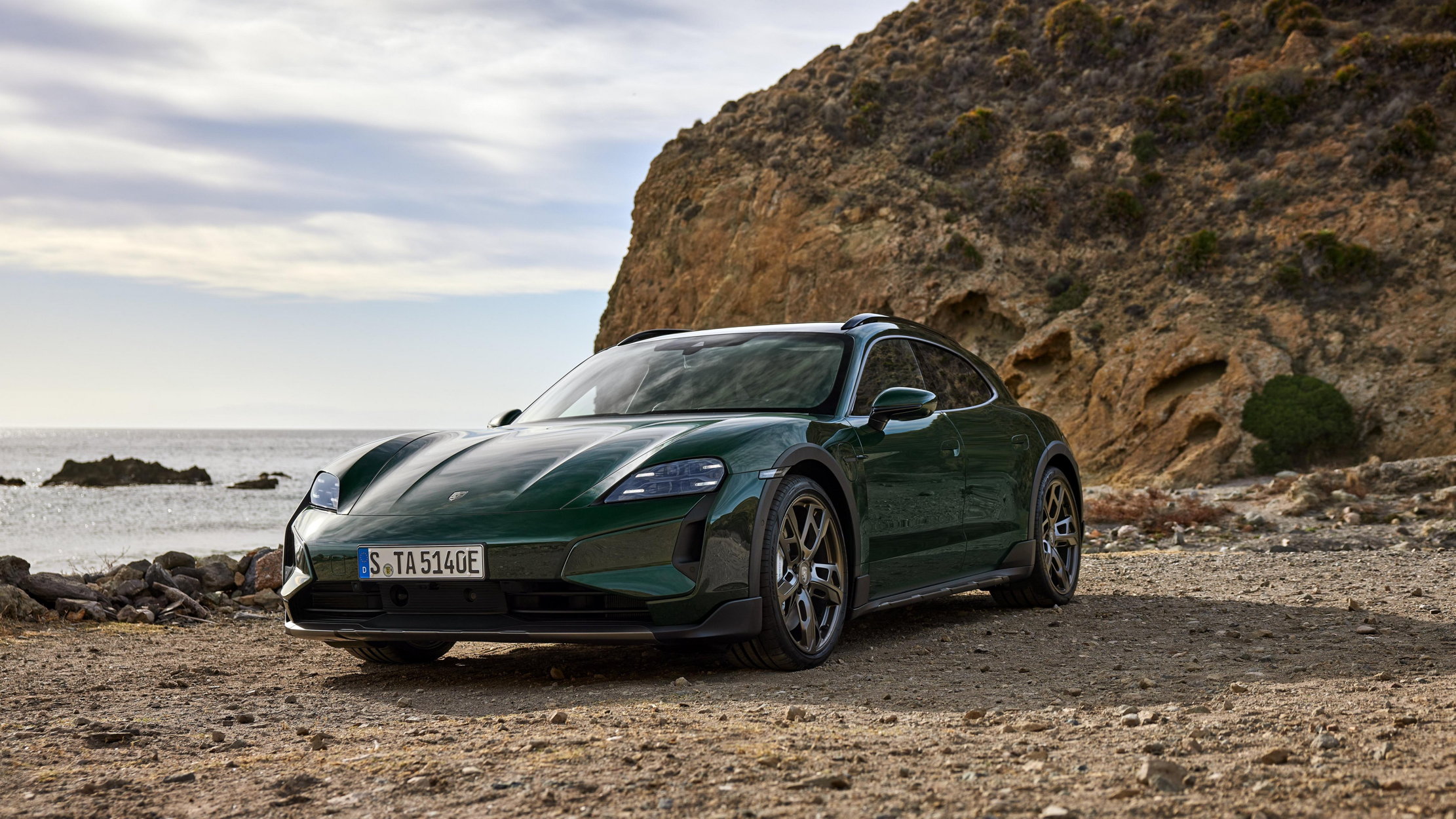A green porsche taycan