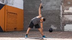 Man working out with a kettlebell