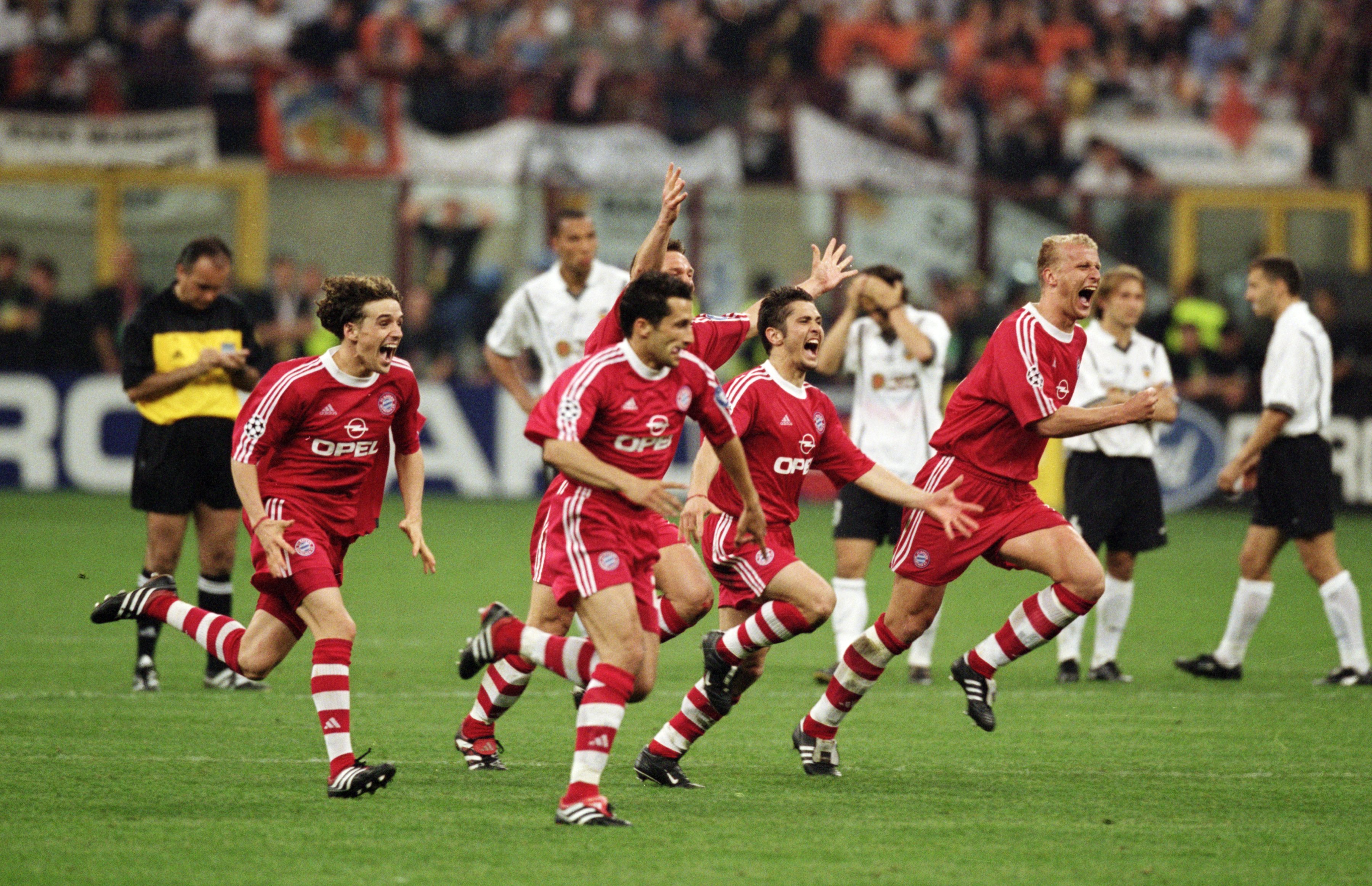 Bayern Munich players celebrate victory on penalties against Valencia in the 2001 Champions League final.