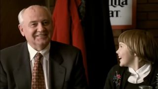 Mikhail Gorbachev enjoying Pizza Hut with his granddaughter
