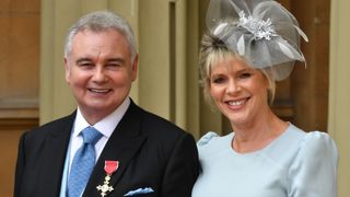 Eamonn Holmes, with his wife Ruth Langsford, as he wears his OBE (Officer of the Order of the British Empire) after it was awarded to him by Queen Elizabeth II for services to broadcasting during an Investiture ceremony at Buckingham Palace on June 1, 2018 in central London.