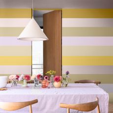 A dining room with painted stripes