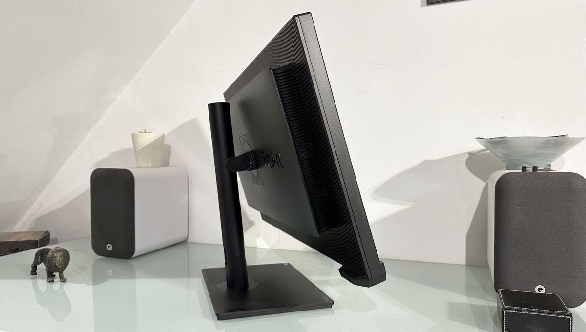 The Asus ProArt PA32KCX 8K monitor on a white desk in a home office during our review process