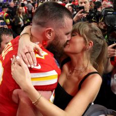 ravis Kelce #87 of the Kansas City Chiefs and Taylor Swift embrace after defeating the San Francisco 49ers in overtime during Super Bowl LVIII at Allegiant Stadium on February 11, 2024 in Las Vegas, Nevada.