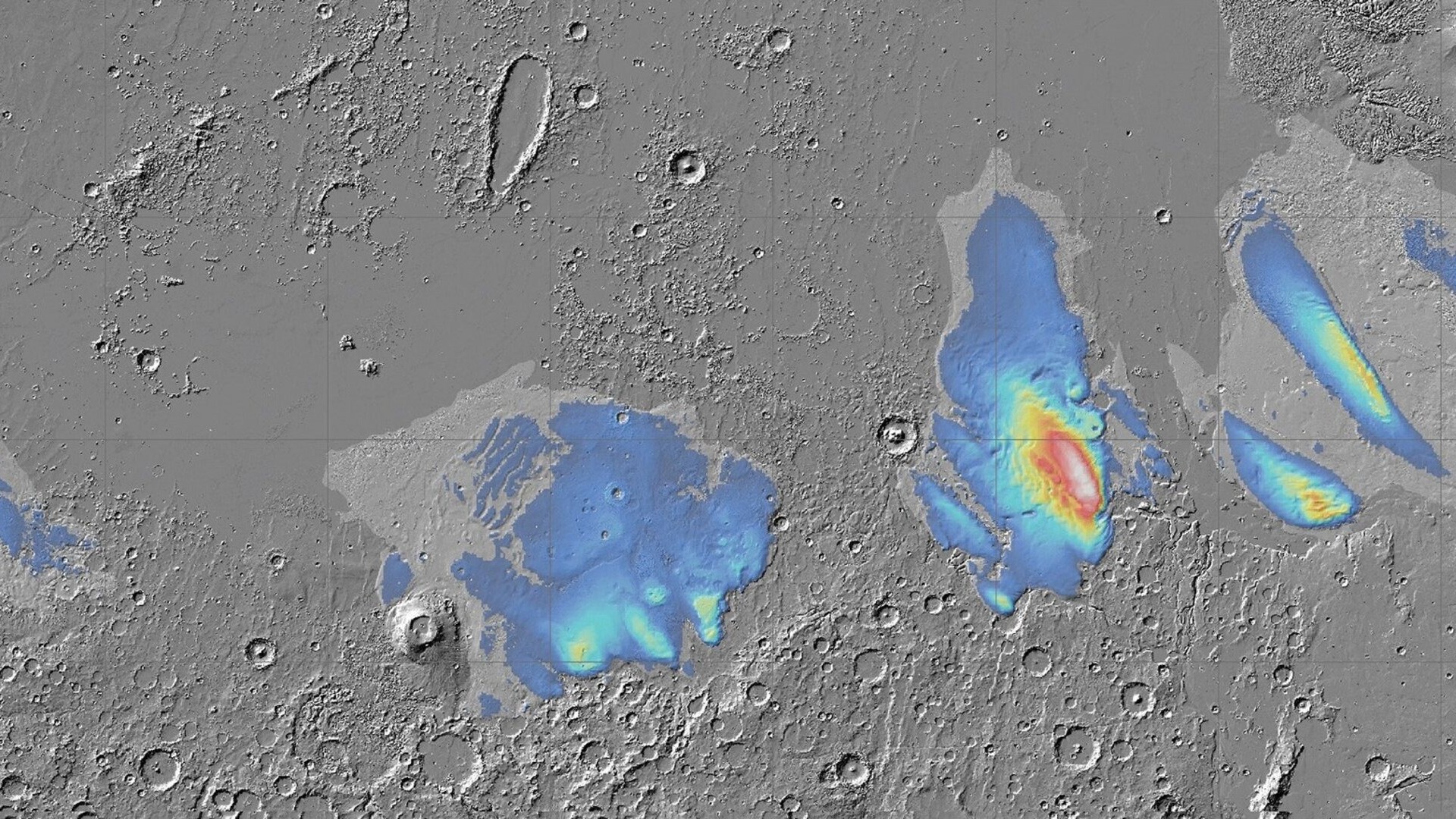 false-color blue and green splotches on a cratered grey surface