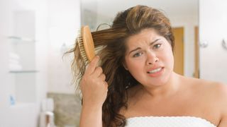 Woman dealing with thinning hair