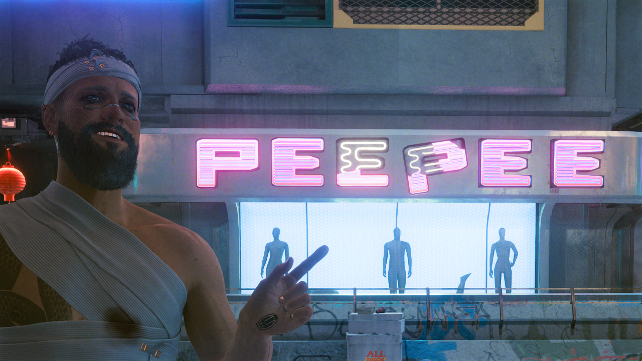 V poses in front of a Pee Pee sign