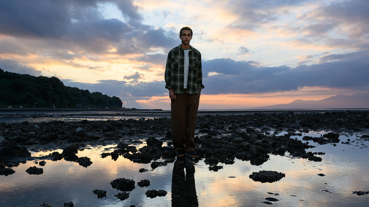 A sample photo of a man on a dark beach taken with the Nikon Nikkor Z 24-105mm f/4-7.1 lens