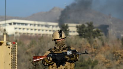 An Afghan special forces guards the Intercontinental hotel