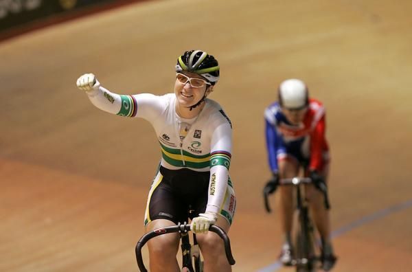 Anna Meares punches the air after her Keirin win