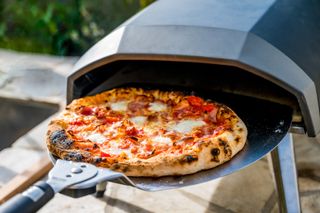 Best pizza ovens - Testing a pizza in an Ooni pizza oven