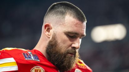 ight end Travis Kelce #87 of the Kansas City Chiefs walks off the field after the first half during Super Bowl LVIII against the San Francisco 49ers at Allegiant Stadium on February 11, 2024 in Las Vegas, Nevada. 