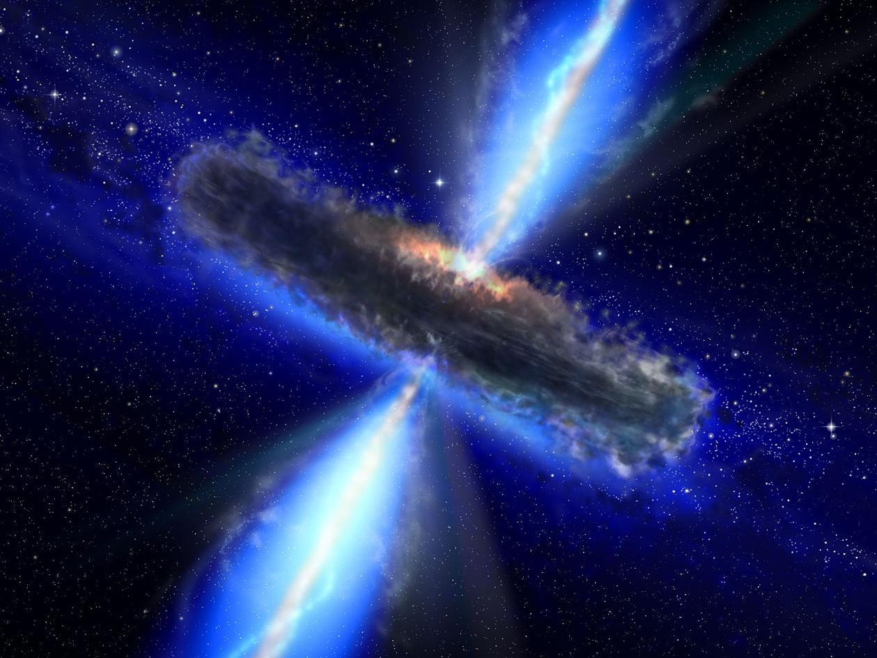 An artist&#039;s illustration depicts a quasar, or supermassive, ultra-luminous black hole.