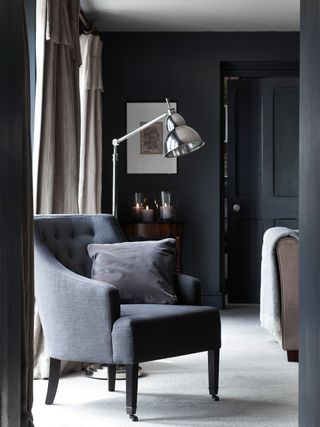 Neptune charcoal living room walls with charcoal armchair