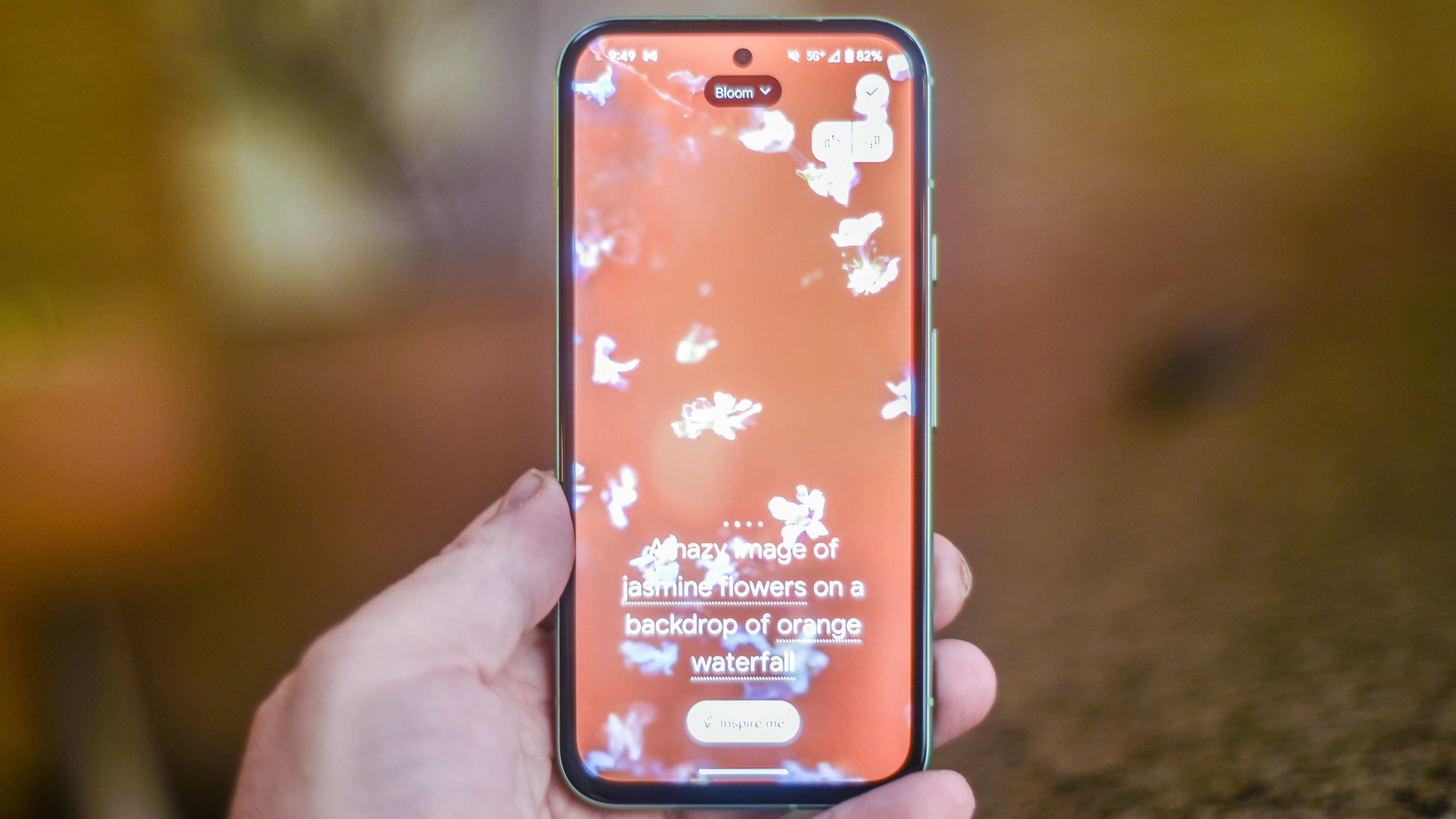 Google Pixel 8a with the screen displaying a floral wallpaper