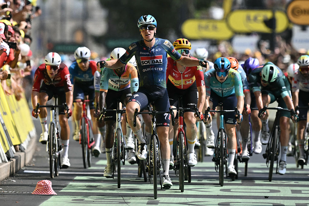 Soudal Quick-Step team's Belgian rider Tim Merlier cycles to the finish line to win the 7th stage of the 113th edition of the Tour de France cycling race, 175 km between Hagetmau and Bordeaux in southwestern France, on July 10, 2026. (Photo by Jeff PACHOUD / AFP)