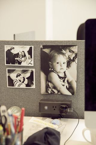 A photo of Kantor and her daughter at her desk