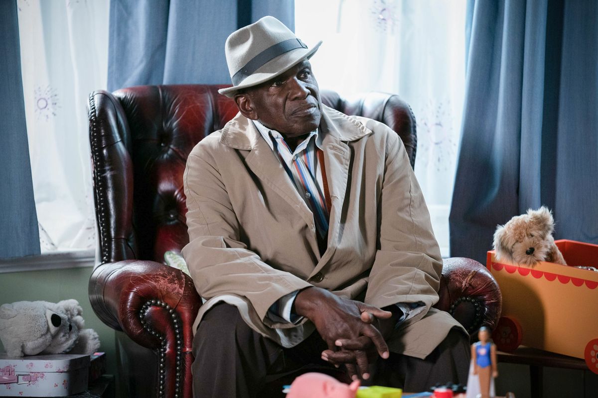 Patrick Trueman sitting in a chair