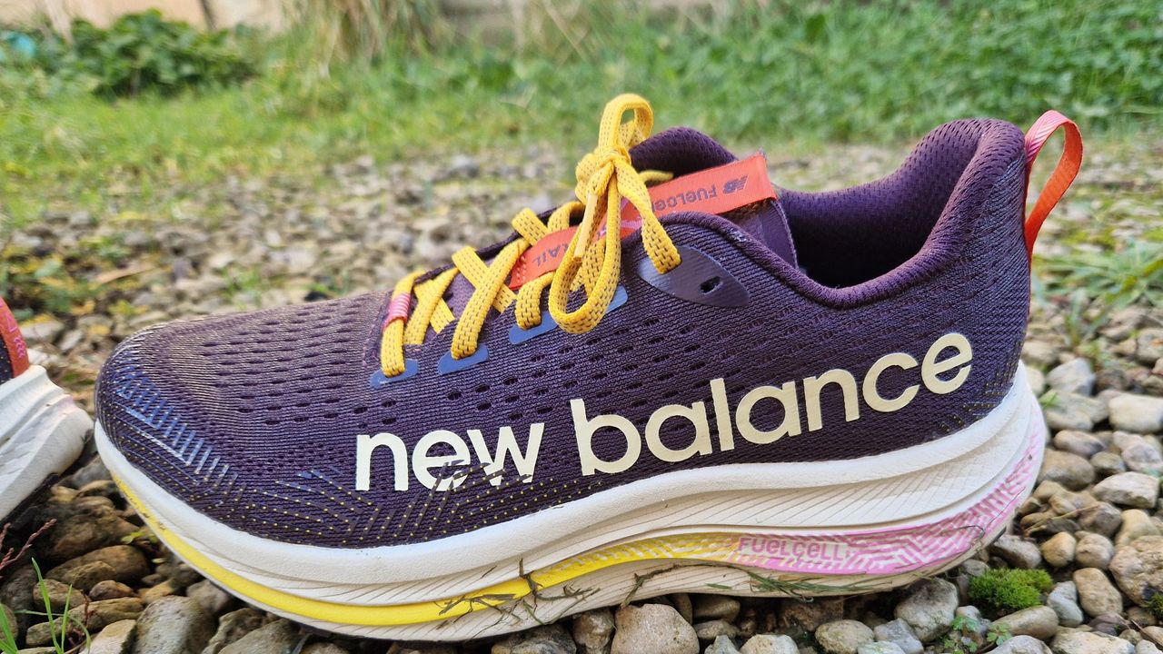 New Balance FuelCell SuperComp Trail on a gravel and grass path outside our tester&#039;s home