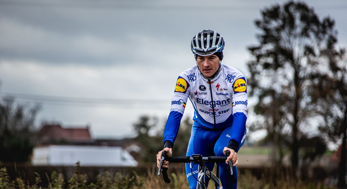 Yves Lampaert shows off Deceuninck-QuickStep’s one-off Elegant-QuickStep jersey that will be used at the 2020 Tour of Flanders