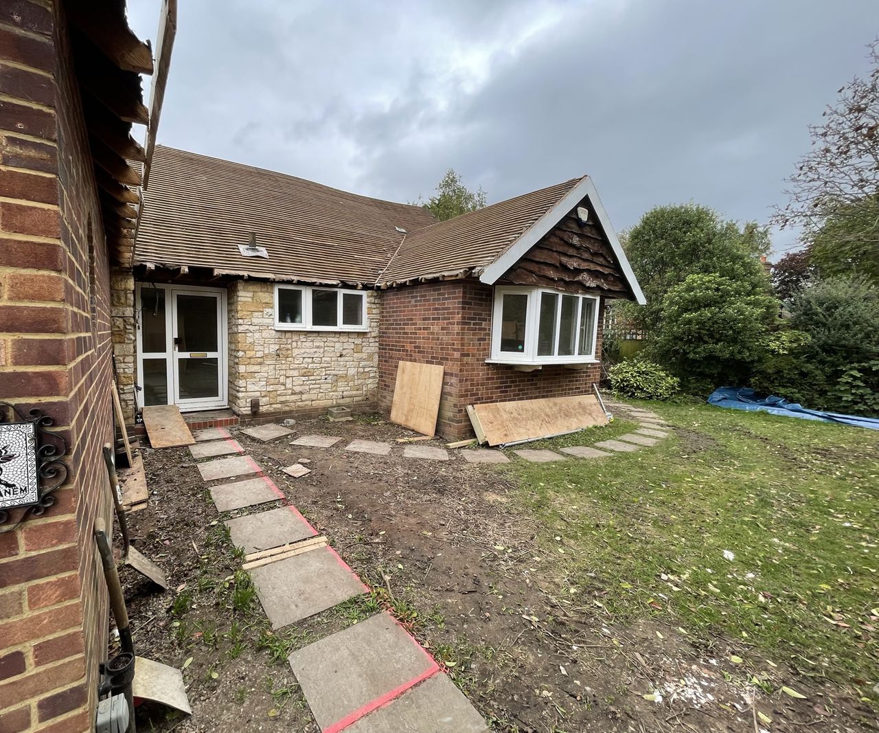 The before picture of a sixties bungalow before a demolition
